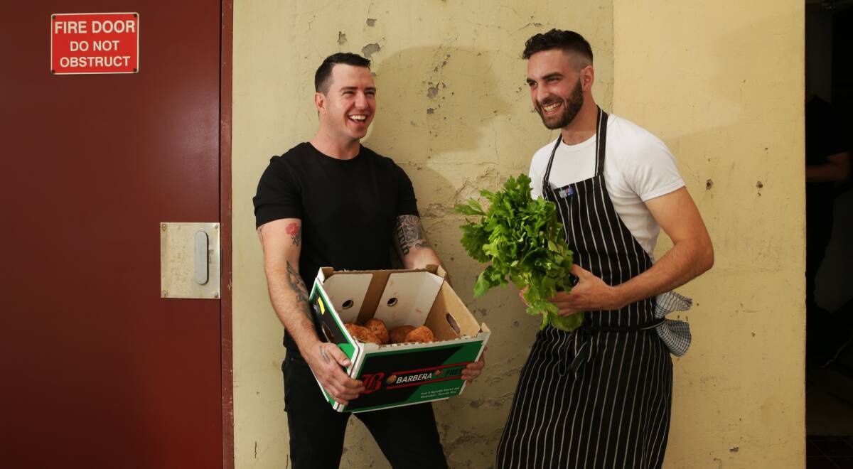 FRESH FACES: Chefs Dave Griffin and Sam Alexander have started working at Reserve Wine Bar in Newcastle. Pictures: Simone De Peak
