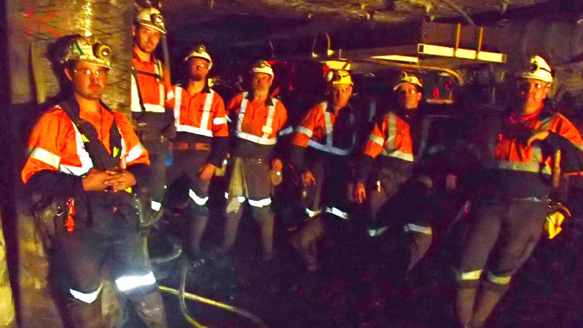 WORKING AGAIN: Integra’s development crew after cutting first coal in the underground mine last night