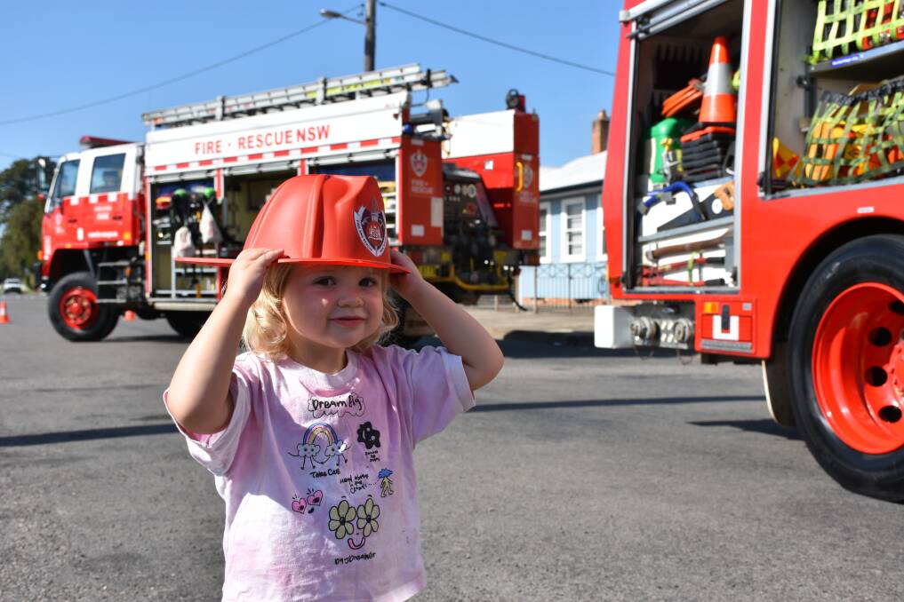 At the 2023 Fire & Rescue Open Day Nadia Yeo liked the big red hat that she received from Singleton Fie & Rescue. Picture by Louise Nichols.