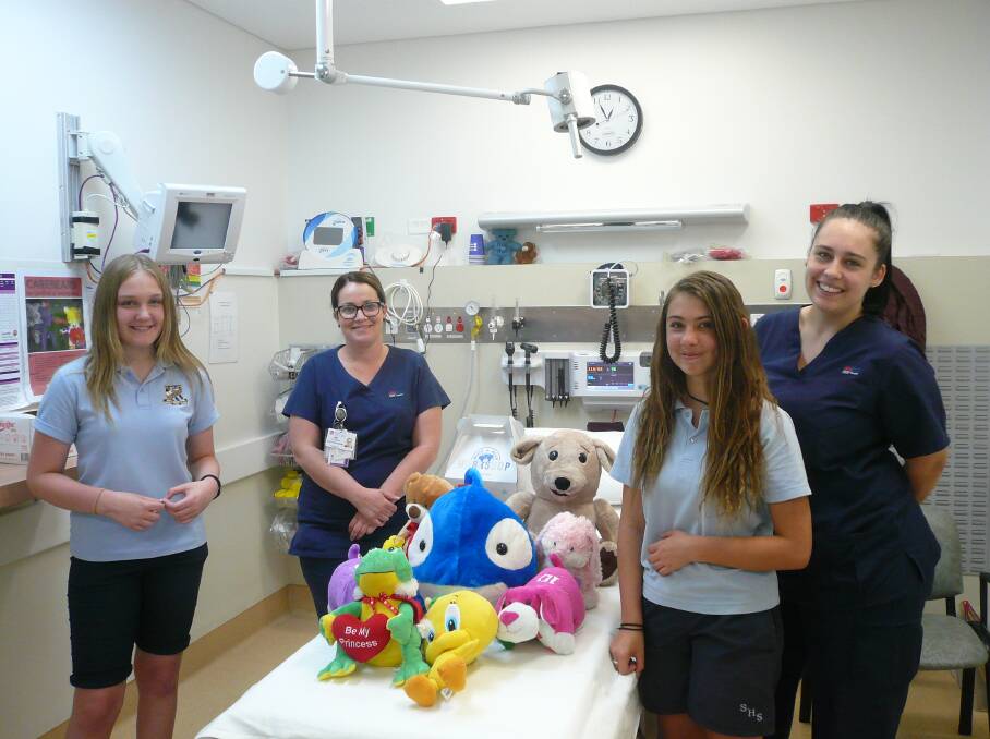 DONATION: Mikayla Brown, Nat Collinson, Makenzie Brook and Emma Peterson with the new soft toys for the hospital's emergency ward. 