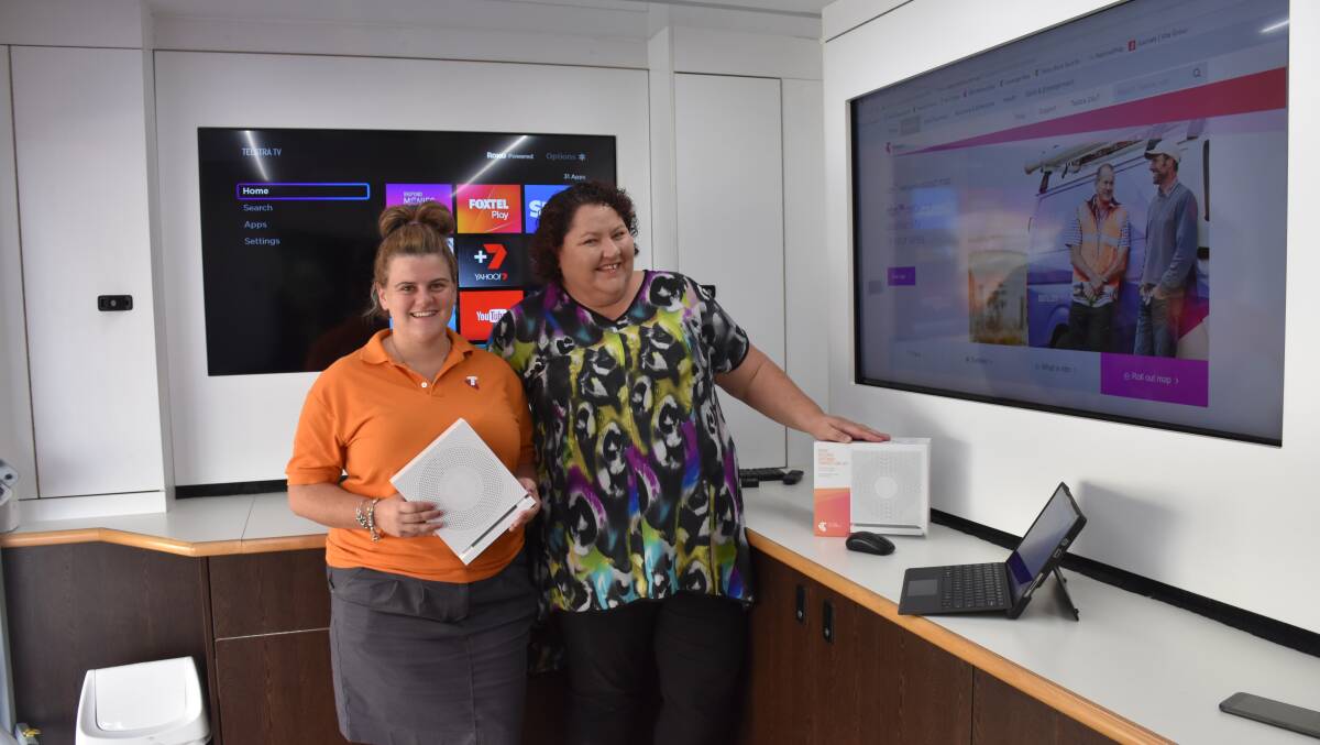 Singleton Telstra Store's, Amy Murrell with Hunter and Central Coast Telstra Area General Manager Tricia Wilson at the launch of Telstra's NBN service. 