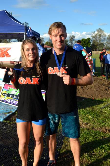 FIRST TIMERS: Newcastle couple Megan MacAuslan and Rhyan Bassett came third in the Wife Carrying Competition.