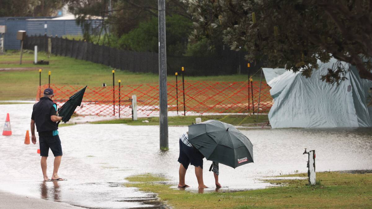 A campsite is inundated with the water at Stockton Caravan Park. Picture by Peter 
