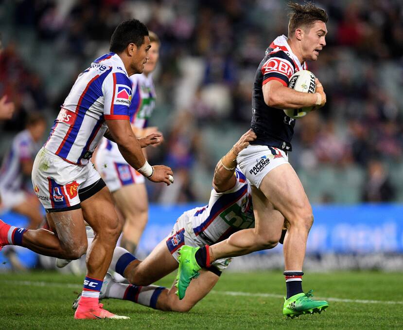 Newcastle bound: Connor Watson breaks out of a tackle in the Roosters' 28-4 win over the Knights on Friday. Picture: AAP