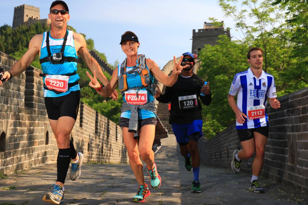 ON THE RUN: Singleton’s Jeff and Anita Phillips tackle the half marathon section of the Great Wall of China Marathon.