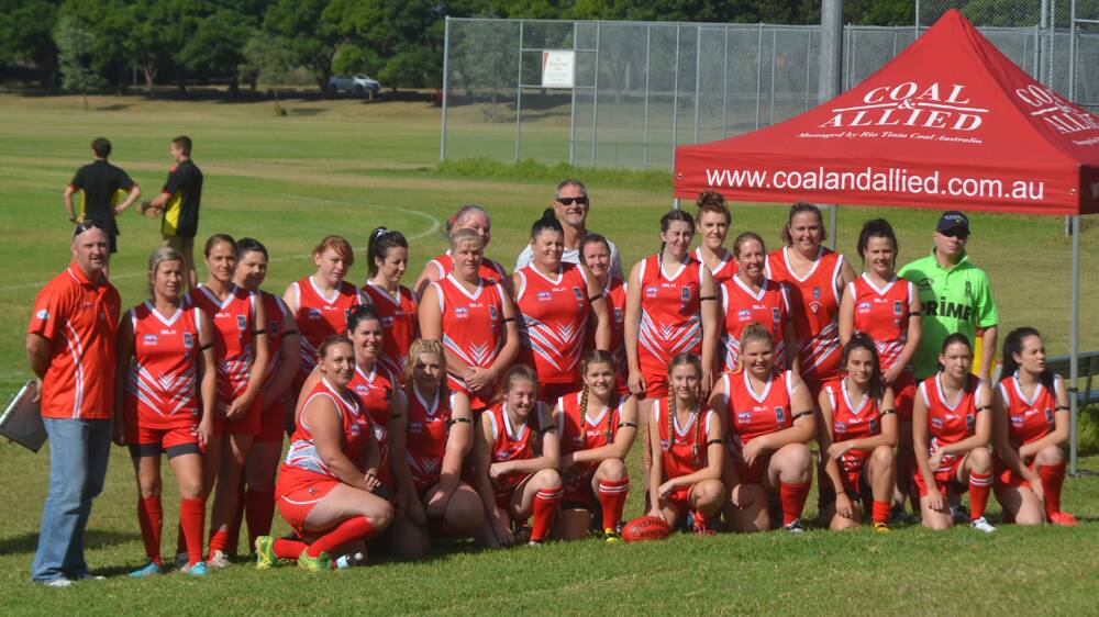 NEW ERA: The newly-named Singleton Roosterettes, who made their historic debut in the Black Diamond AFL women’s competition at Rose Point Park on Saturday.