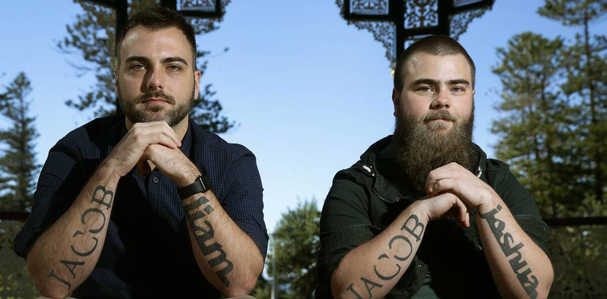NOT FORGOTTEN: Josh (left) and Liam Hewitt have their brother Jacob's name tattooed to their arms, along with each other's names.  