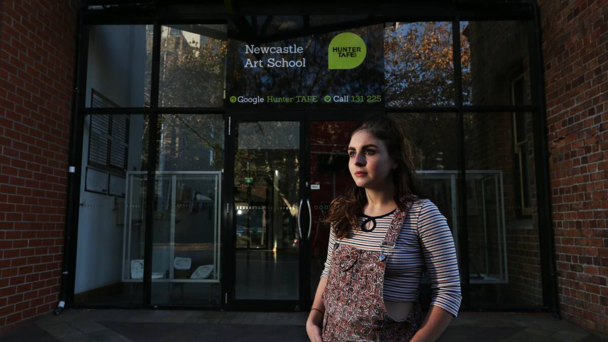 SIBLING EXPERIENCE: Visual arts student Maisie Neale says her days at Hunter TAFE don't stack up with those of her brother. Picture: Simone De Peak