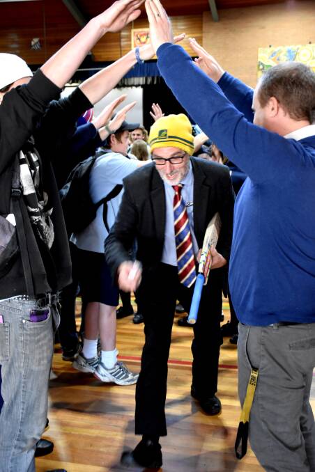 CELEBRATION: The students clapped and cheered as Mr Skilton concluded the assembly. 