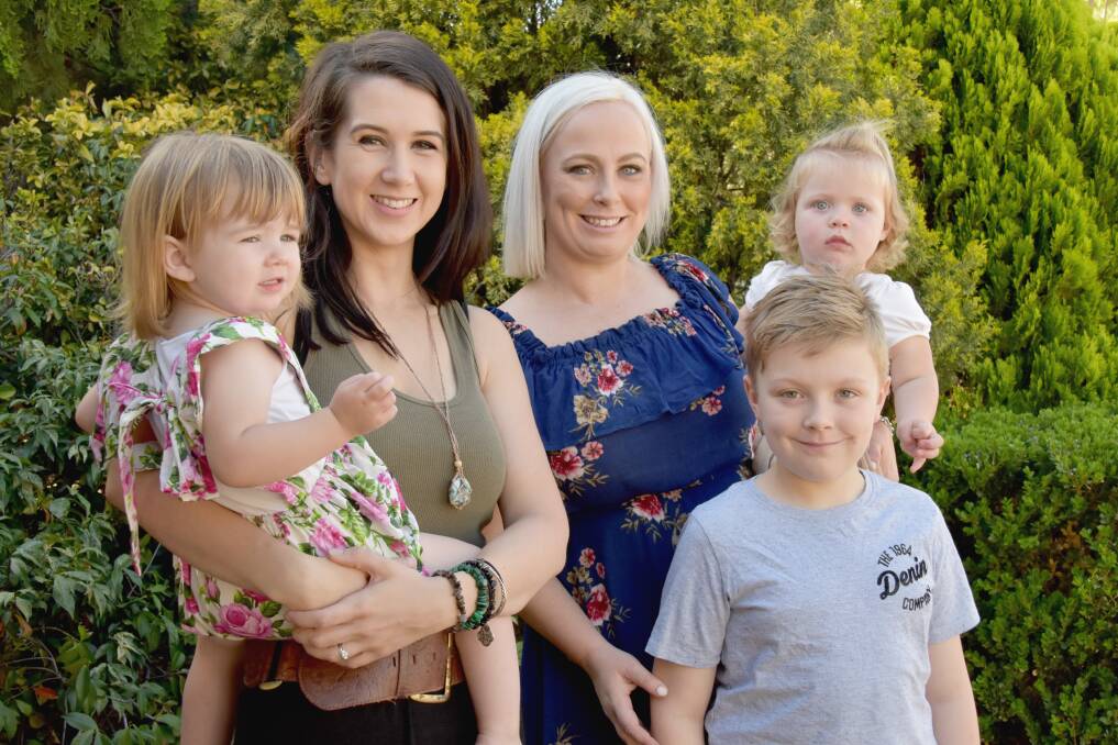FAMILY FUN: Beth Scott holding daughter Anna and Kirsty Boag with daughter Annika and son Christian.  