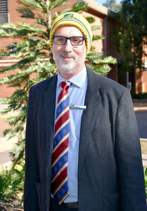 FAREWELL: Deputy Principal, Ian Skilton said goodbye to the school at a formal assembly this morning. Never one to shy away from supporting a good cause, Mr Skilton wore a beanie to show his support for the school's beanie for brain cancer day.