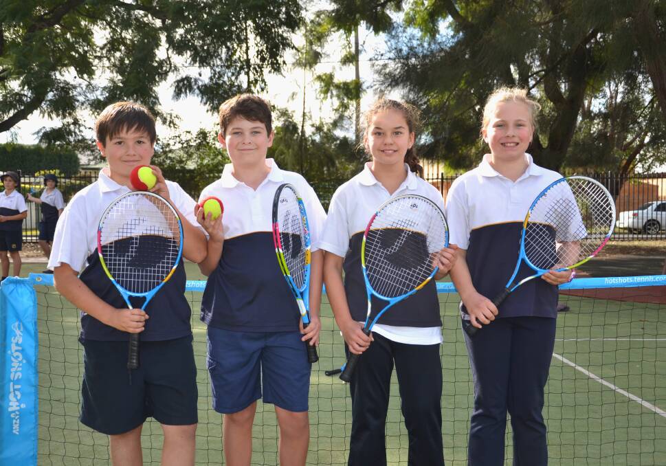 HOT SHOTS: Matthew Ella, Miller Damstra, Kaitlin Vanzyl and Ruby Menere say they have all had great fun learning to play tennis. 