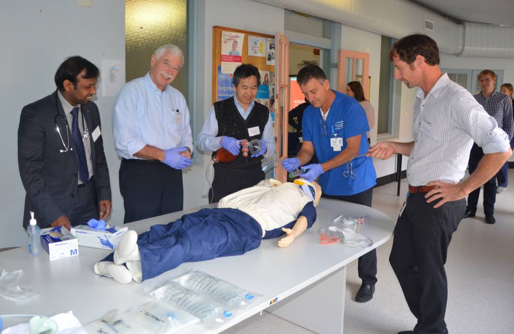EMERGENCY CARE: Singleton medical staff doing stimulus training under the guidance of Dr Loten (left). 