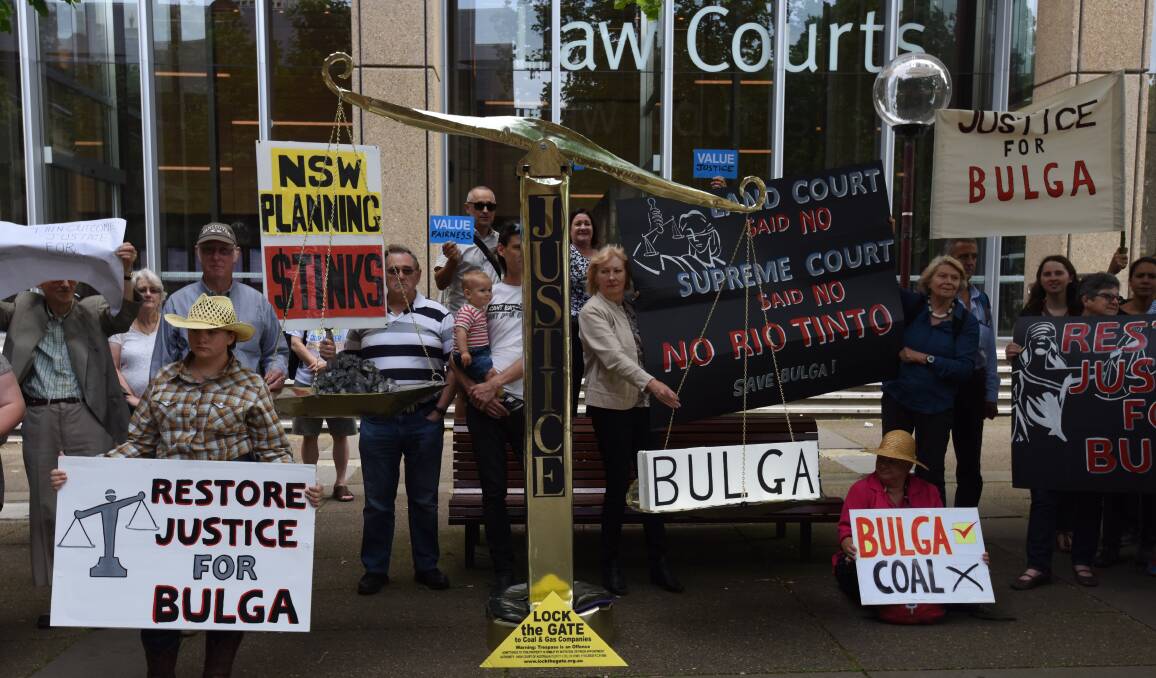 Protest: Bulga residents protest in Sydney against Rio Tinto's Mount Thorley Warkworth expansion plans. While residents twice beat Rio in court, the expansion was approved. 