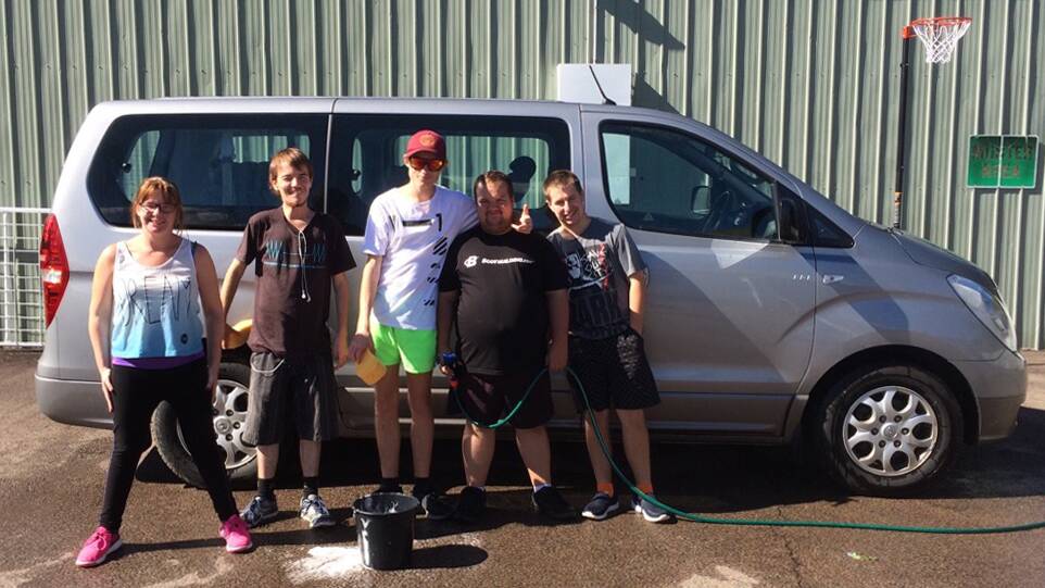 NEW SERVICE: The crew from Singleton Endeavour group are ready to make your car sparkle.