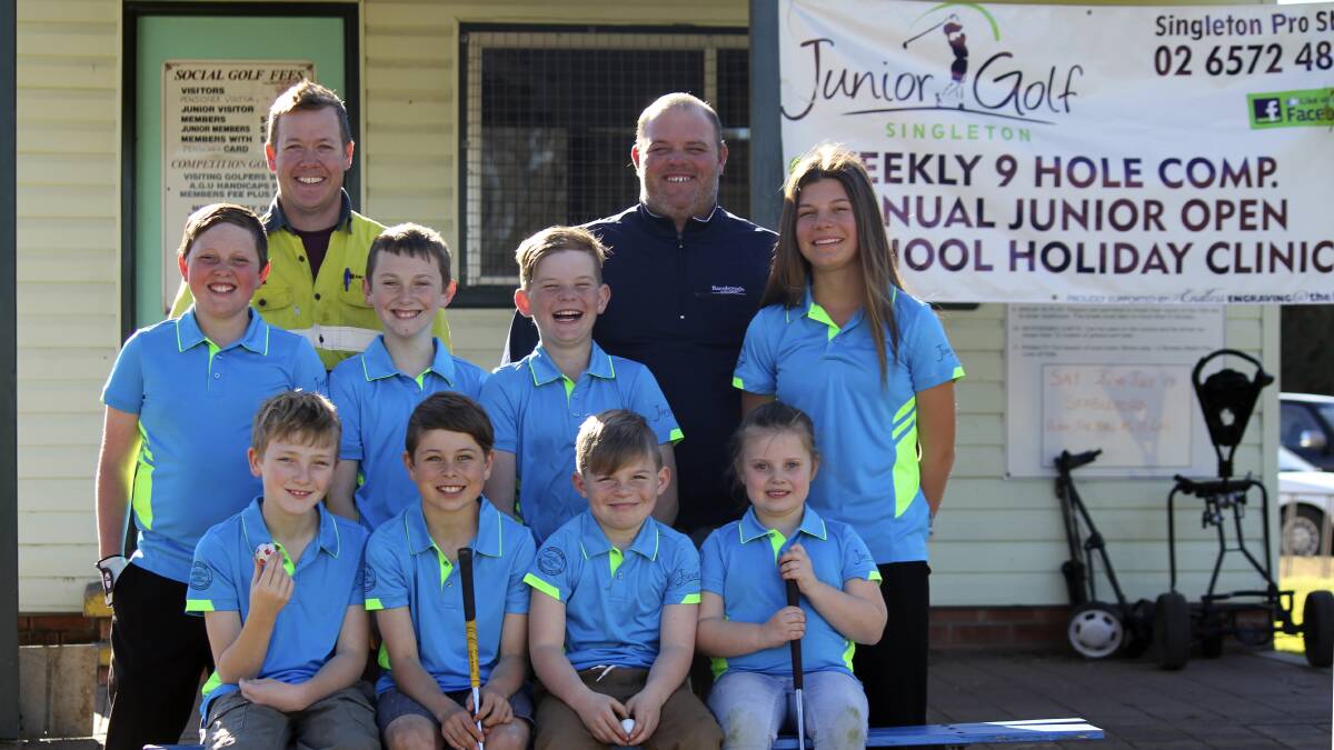 FIRST-EVER: Nick Carey, representing the events major sponsor Monadelphous, with some of our current junior golfers.