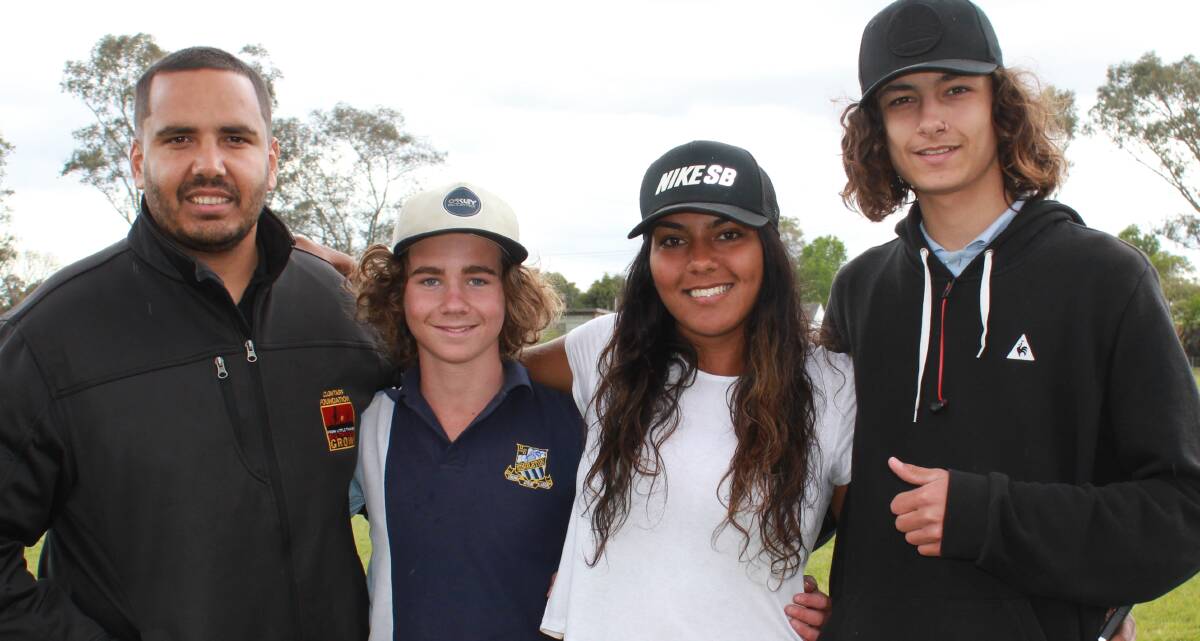 IMPORTANT MESSAGE:  Director Joel Parsons and rising star Mahalia Murphy with students from the Singleton Clontarf Academy.