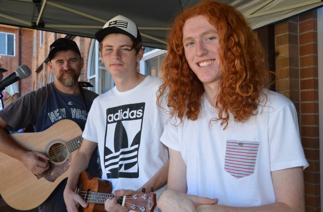 TALENTED TRIO:  The Upcroft family kept the crowd entertained on Sunday.