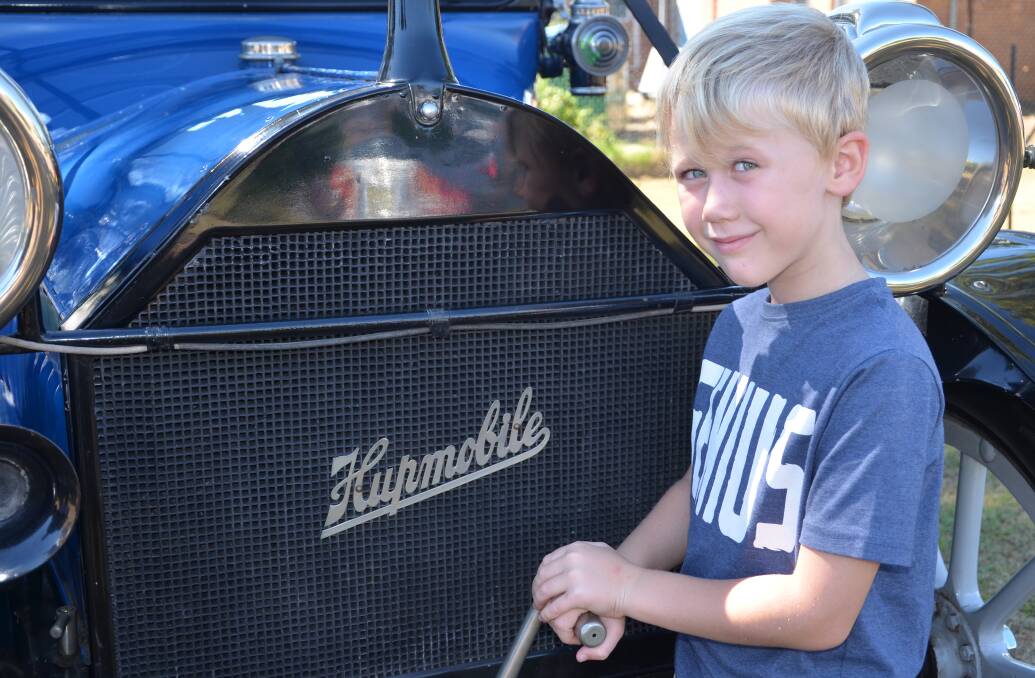 LETS GO:  Payton Bourke likes going for a drive in his Grandfather's vintage car.