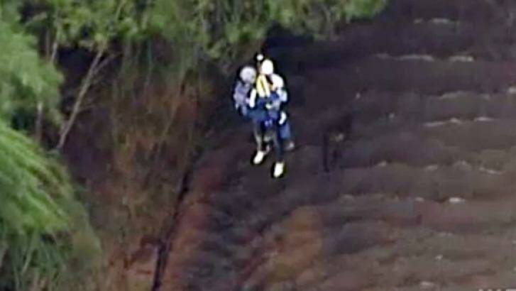 Passengers being winched to safety in Nattai National Park. Photo: Channel Nine