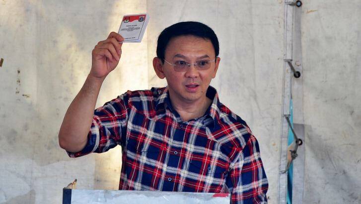 Jakarta's governor Basuki Ahok Tjahaja Purnama casts his ballot last week. Photo: Jefri Tarigan