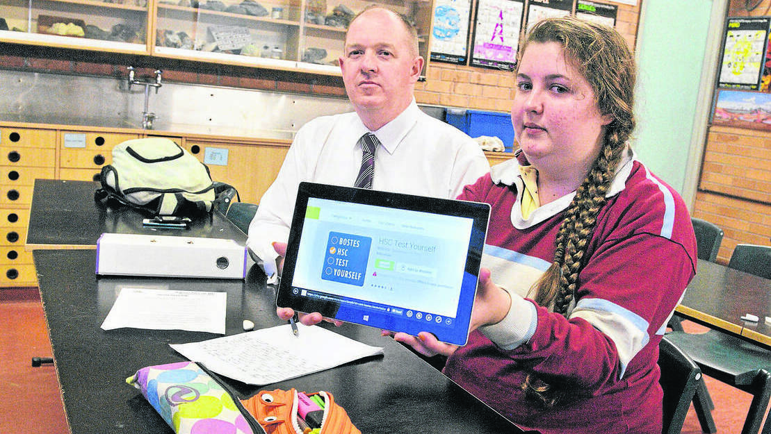 Rutherford High School science head Steven Edwards and year 12 student Melanie Ware road test the study app.