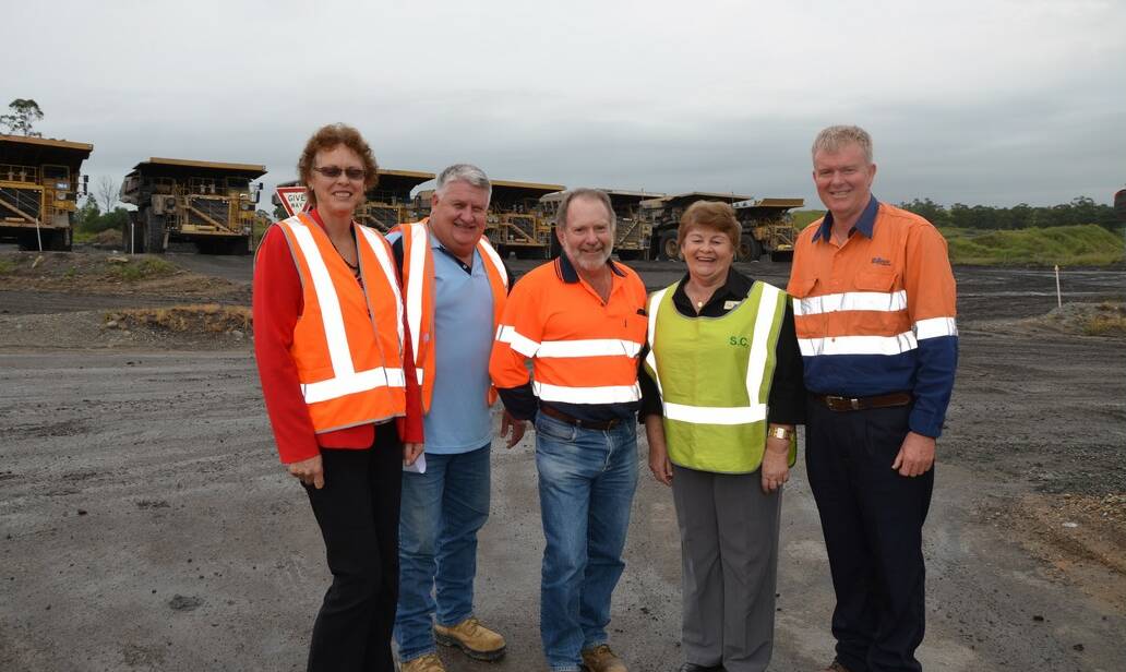 Singleton Chamber of Commerce and Industry, secretary Gill Eason and president Ryan Fitzpatrick with Rix's Creek senior environmental officer John hindmarsh, Singleton councillor Val Scott and Garry Bailey, general manager Bloomfield group.