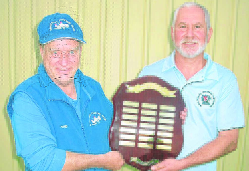 SHIELD WINNERS:

President of the Rare Poultry Breeders Association, Grant Andrews  (right)  presents  the trophy to David Dixon, president of Singleton Poultry Club. 
