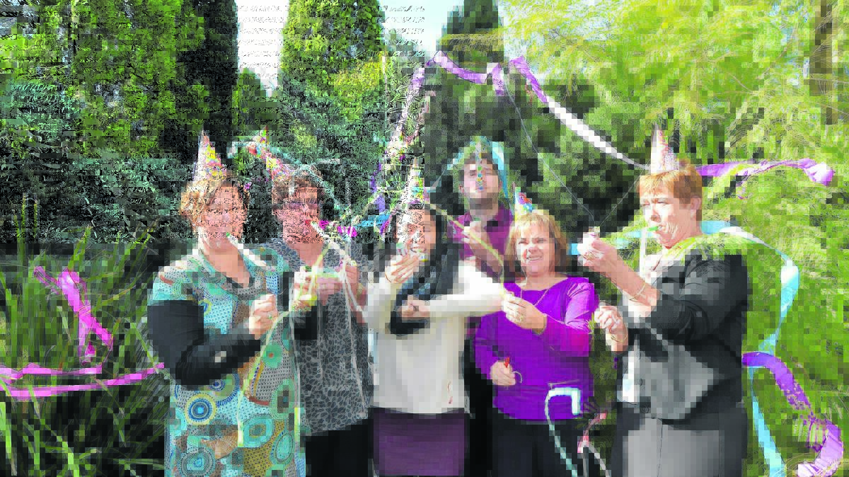 CELEBRATING A MASSIVE MILESTONE:  The current Singleton Argus staff  (left to right) Lena Botha, Julie Corrigan, Katy Fox, Declan Martin, Julie Bullock and Vicki Caelli  are ready to party with their readers today. 													 (Absent: Louise Nichols and Shannon Dann.) 

