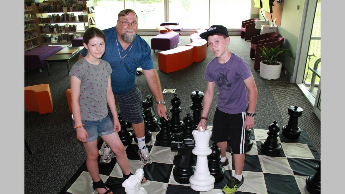Brigid Fleming, Doug Wright and Jordan Donahue practise their skills at chess