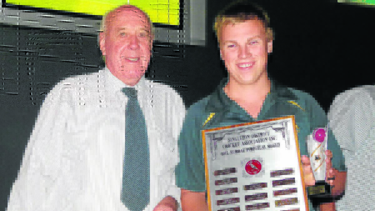 OUTSTANDING:  Cael Smith (right) received the trophy from John Bull Shield rep player of the year from Mayor John Martin.
