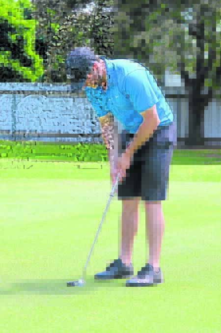 ON TARGET: A grader Paul Flanagan holes a putt on the eighth at Singleton last Saturday.