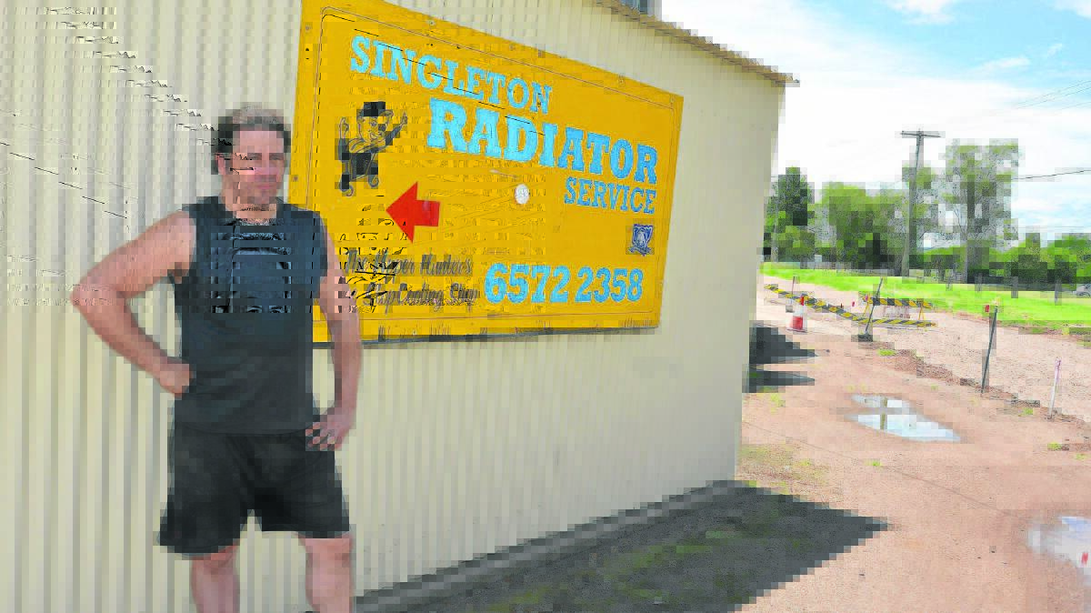 NOT HAPPY: Singleton Radiators owner Tony Sneddon believes lengthy upgrades to Dunolly and Bridgman roads has severely 
hampered his business.