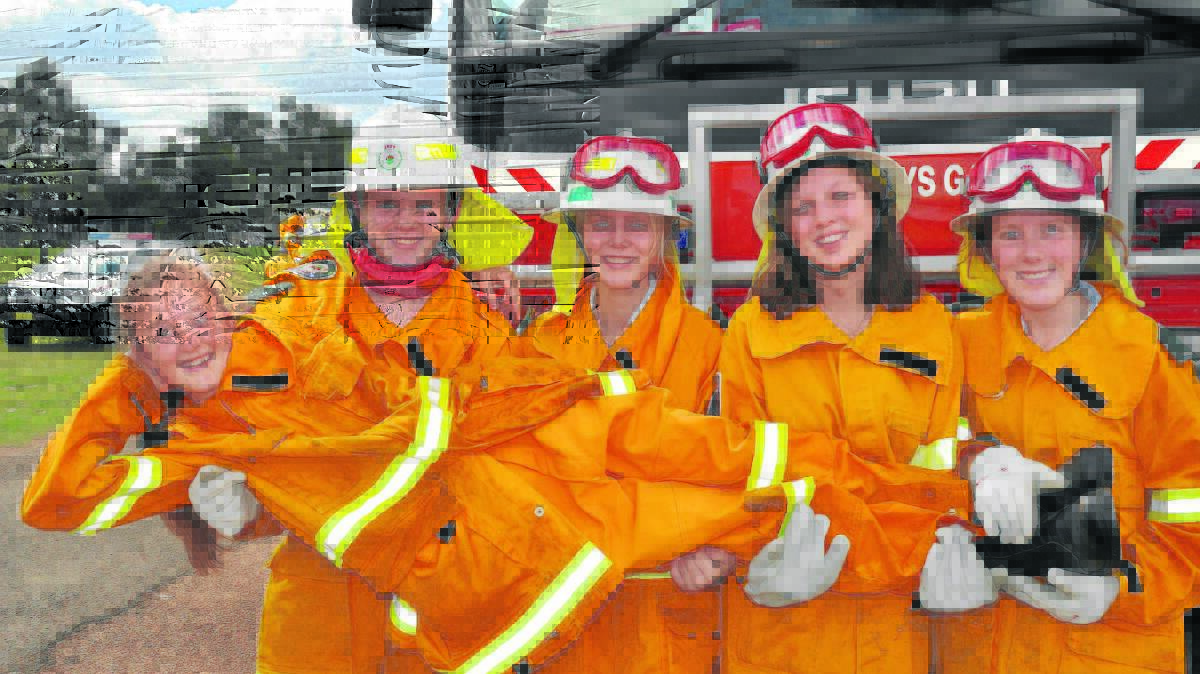 TEAM EFFORT: Courtney Johnson lifted by, from left, Lachlan Thrift, Claudia Kupelian, Shinai Parsons, and Alycia Pillidge, from Singleton High School.