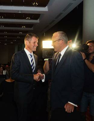 Mike Baird and Luke Foley shake hands at the NSW State Election Debate on February 27, 2015 in Sydney, Australia. (Photo by Christopher Pearce/Fairfax Media)