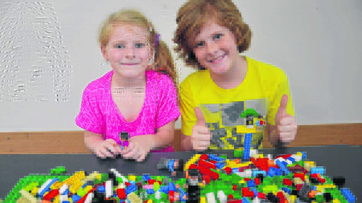 BUILDING THE FUTURE: Reef and Rain Stocks from Branxton at the Singleton Library with the new lego.
