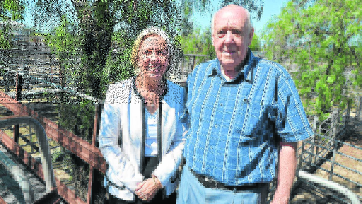 EXCITED:  Singleton Council general manager Lindy Hyam and Mayor John Martin celebrate news that both council’s Resources for Regions funding applications were successful.  Among the projects at the Livestock Markets is construction of covered walkways.