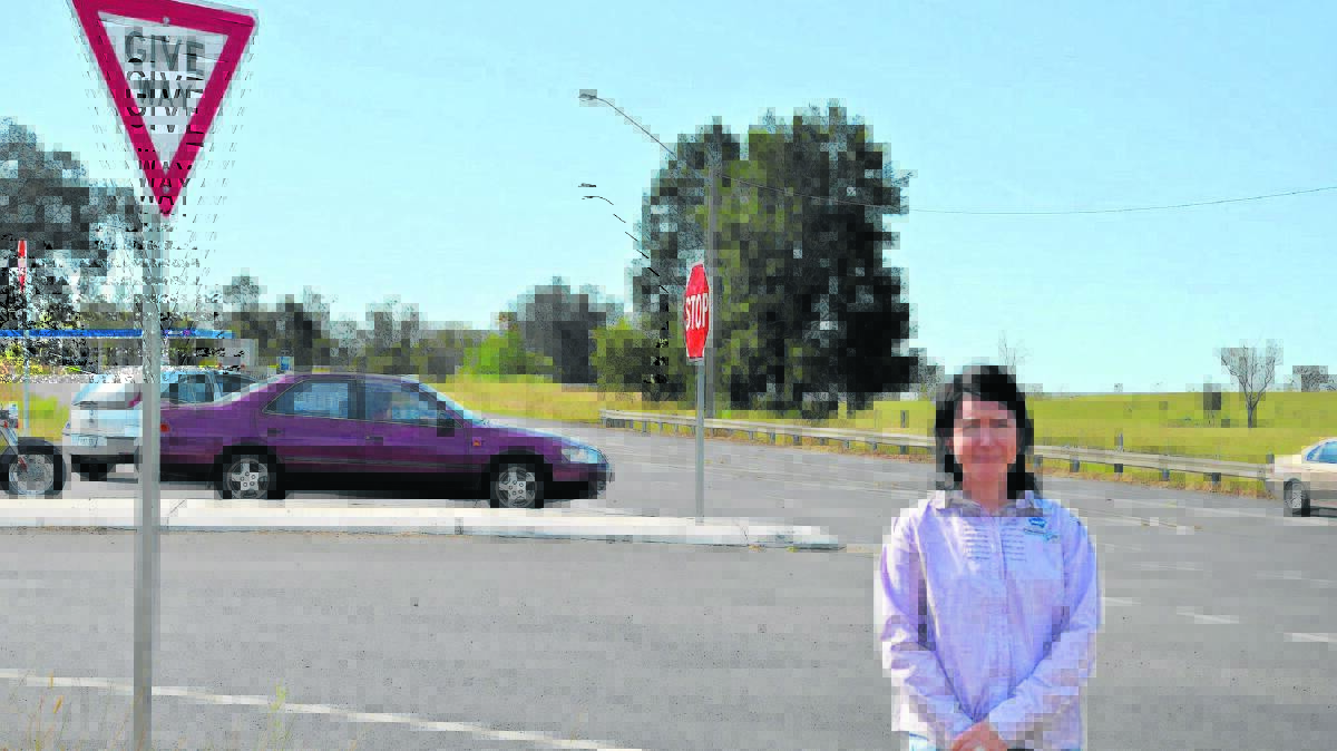 CONCERNED: Megan Ridgers believes traffic signs at the New England-Golden Highway intersection near Whittingham are only confusing motorists.