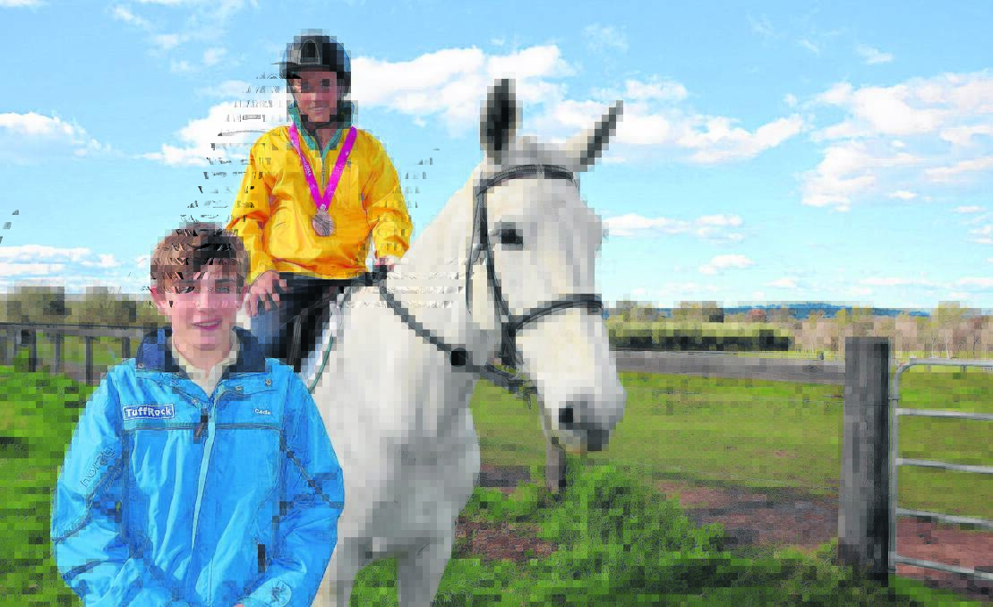 IN THE THICK OF THINGS: Singleton's bronze medal-winning rider Jake Hunter and younger brother Cade (front) will compete in the Australian Showjumping Championships in Victoria.