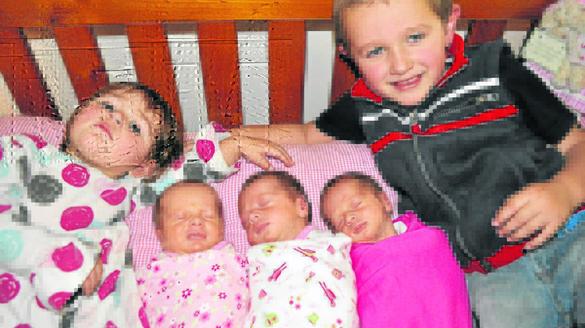 THEN: When the triplets, as well as Frankie and Archie, first appeared in The Singleton Argus in 2009.