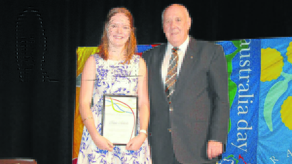 HUMBLED: Singleton’s Young Achiever of the Year Annie Nichols with Singleton mayor John Martin at yesterday’s function.