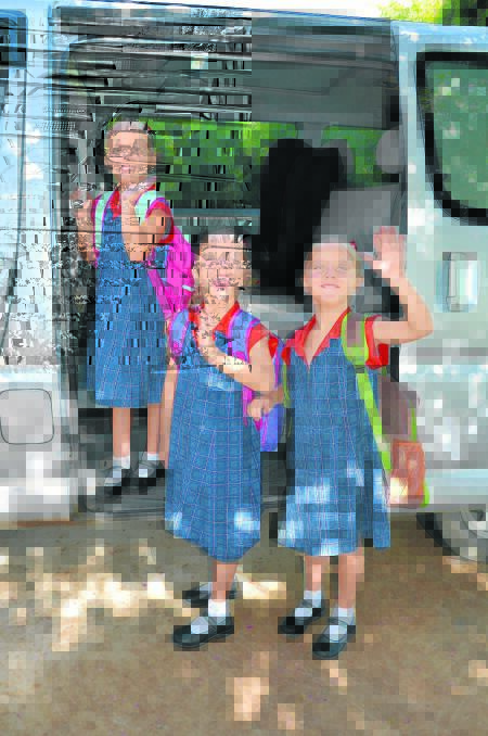 NOW AND ... Singleton triplets Georgie, Immy and Issy Duhring are packed – and ready – to go to King Street Public School next week.