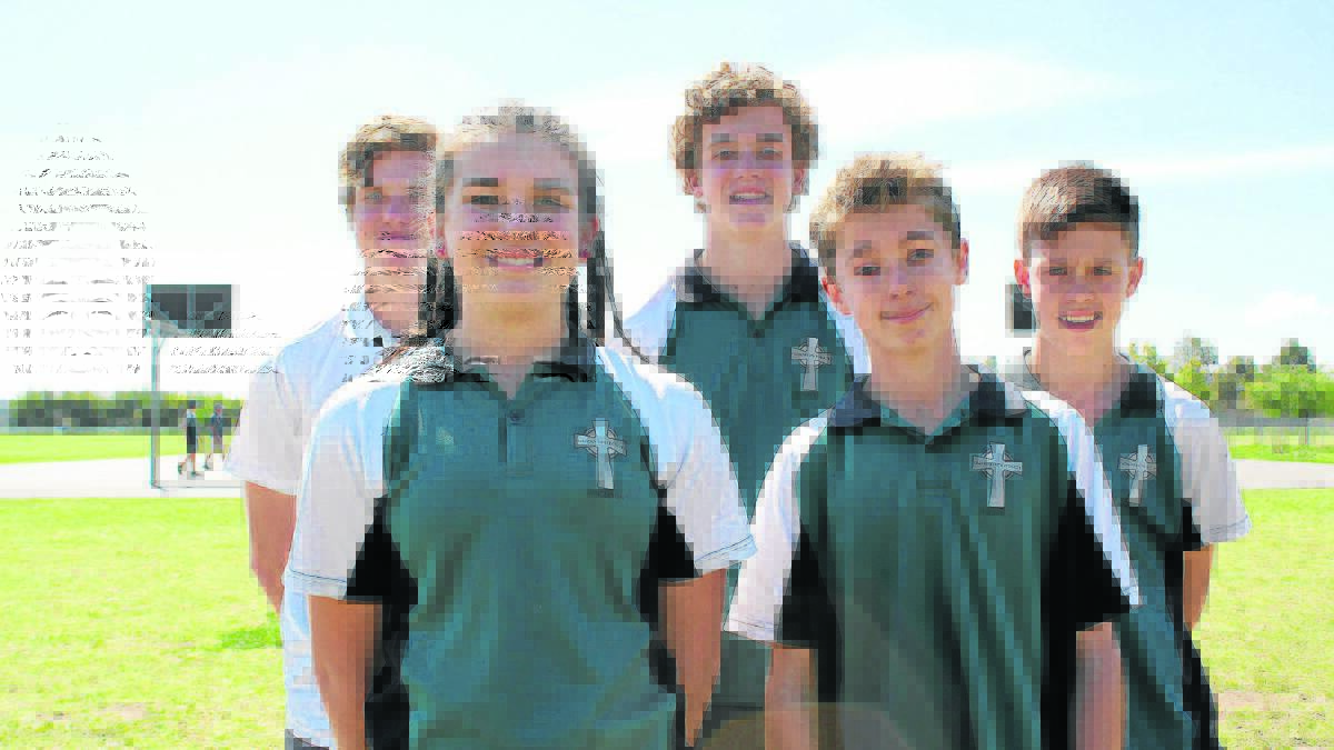 TOP JOB: St Catherine’s Catholic College athletes, back from left, Lachlan Charnock, Tristan Muir, Jackson Amidy and, front from left, Lily Leggett and George Davis.