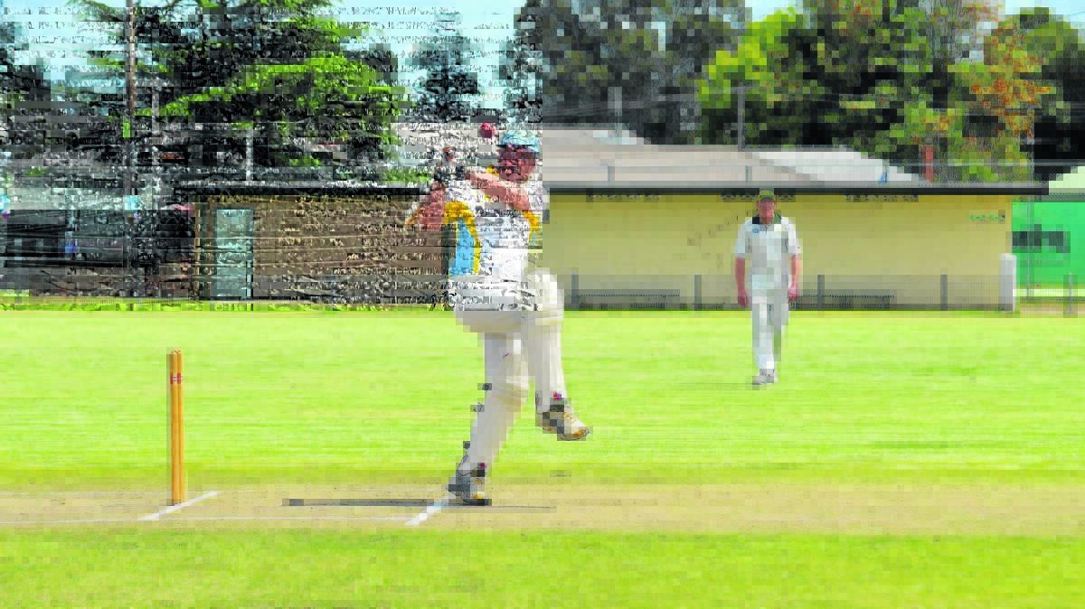 TAKE THAT: Creeks batsman Steve Unicomb smashes a delivery to the boundary at Howe Park on Saturday. He top scored with a handy 25.

