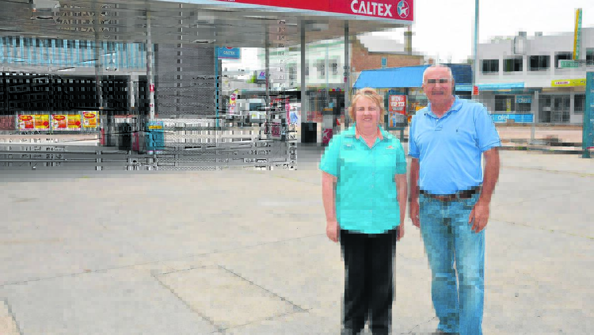 TRADING AS USUAL: Caltex owner George Stamatopoulos and manager Lisa Chevin are urging residents to support local businesses during the Singleton Town Centre Revitalisation Project.