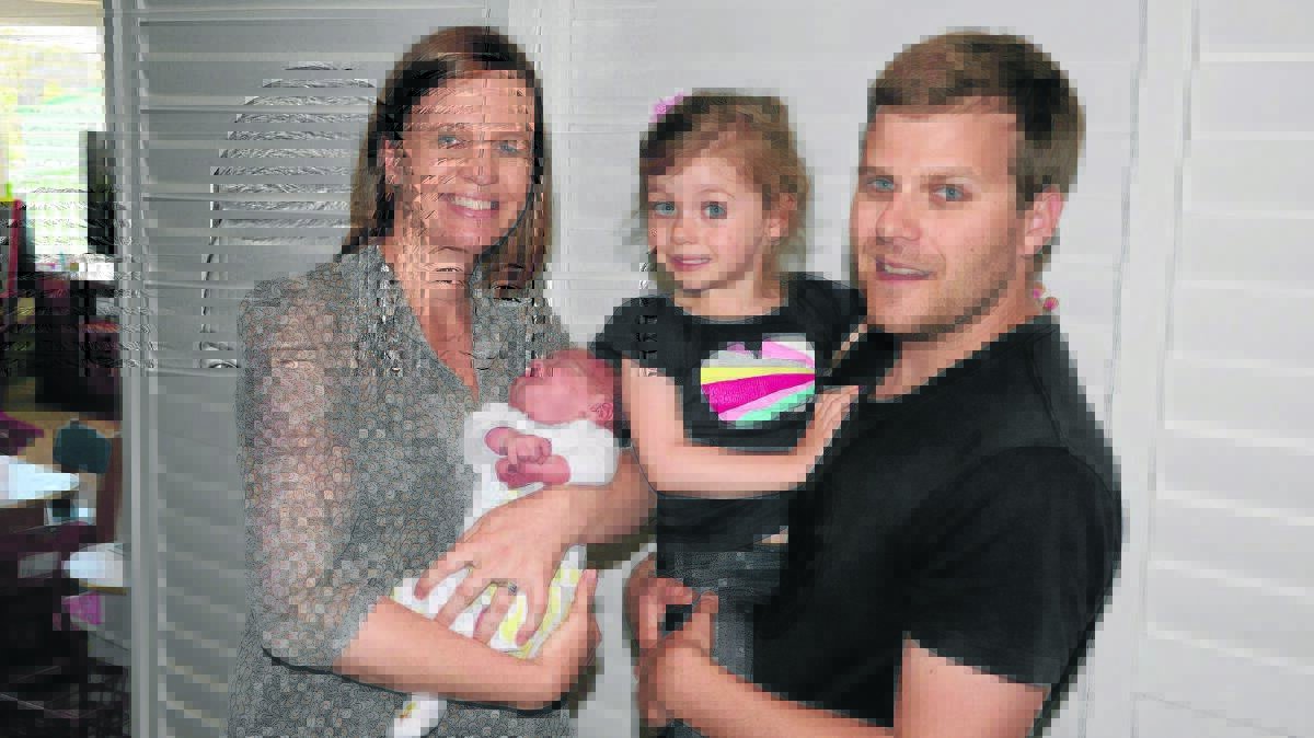 FATHER’S DAY THEY WON’T FORGET: Erin Cole with newborn son Lachy, daughter Lucy and husband Tim at the family home.
