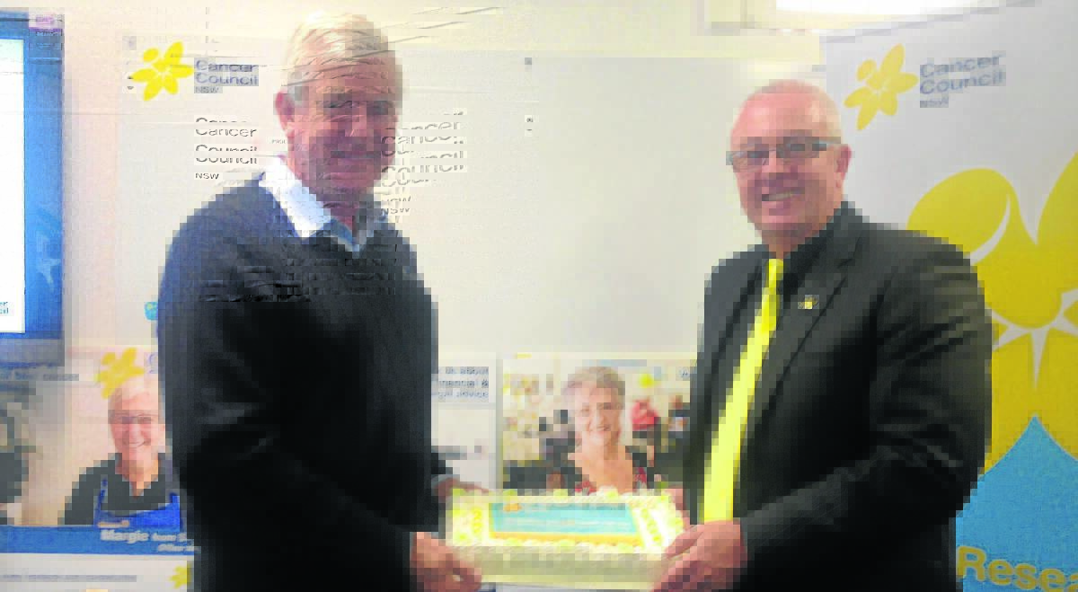 MUCH-NEEDED SUPPORT: The Bloomfield Group managing director John Richards and community relations 
coordinator at Cancer Council in Singleton Glen Parsons.
