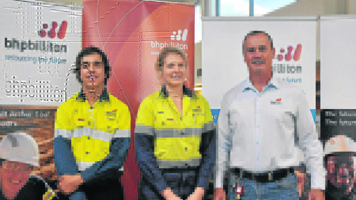 TRADE FUTURE: BHP Biliton’s Mt Arthur coalmine near Muswellbrook welcomes new apprentices. NSW Energy coal asset president Peter Sharpe with Daniel Ellis and Demi Frazer from Singleton.