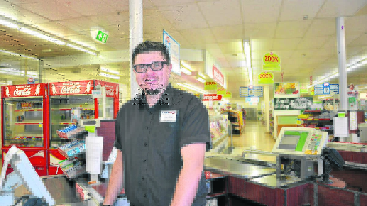 END OF AN ERA: Ritchies IGA Town Square manager Josh Tonnet prepares for the final week of operations in his store, including a 50 per cent clearance sale.