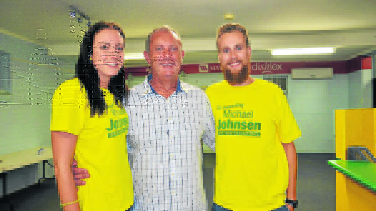 VICTORIOUS: New Upper Hunter MP Michael Johnsen with his daughter Lucy Johnsen and Callum Maclean on Saturday night.